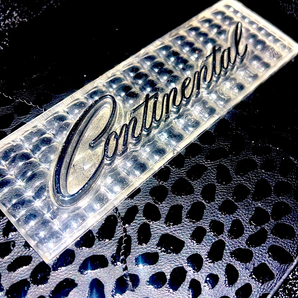 ORIG 1970s era Lincoln Continental emblem on lens